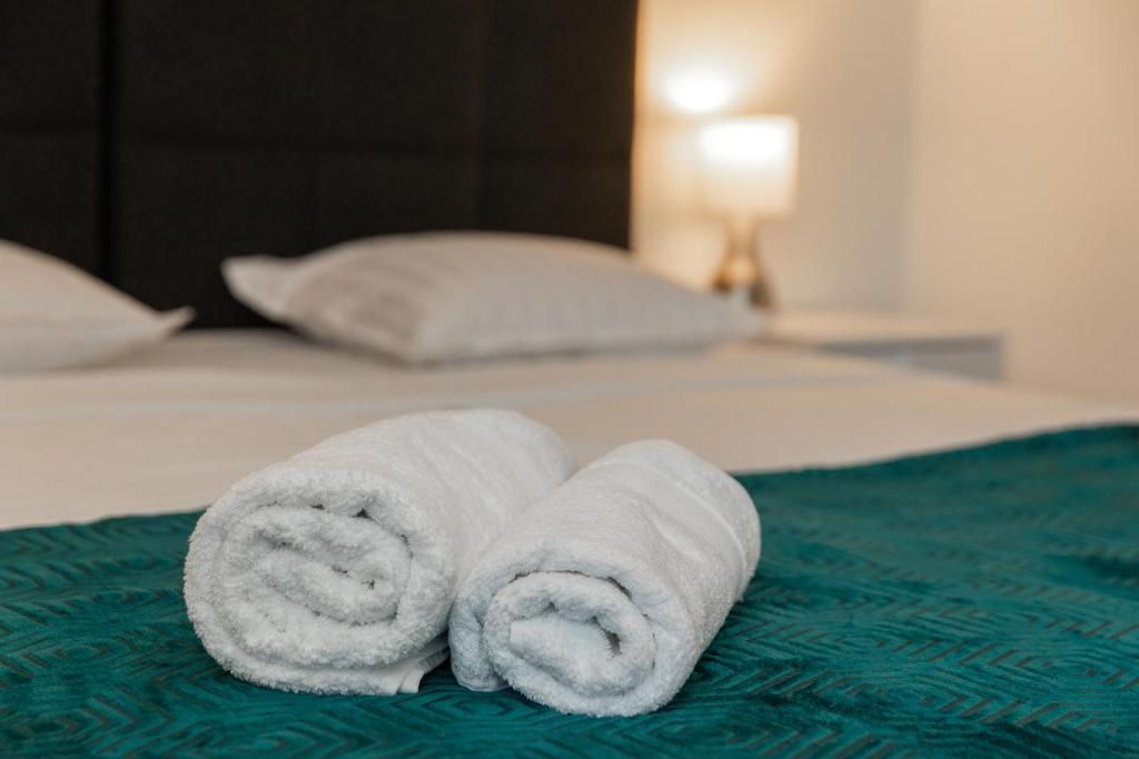 Postel nebo postele na pokoji v ubytování Apartman Gulin