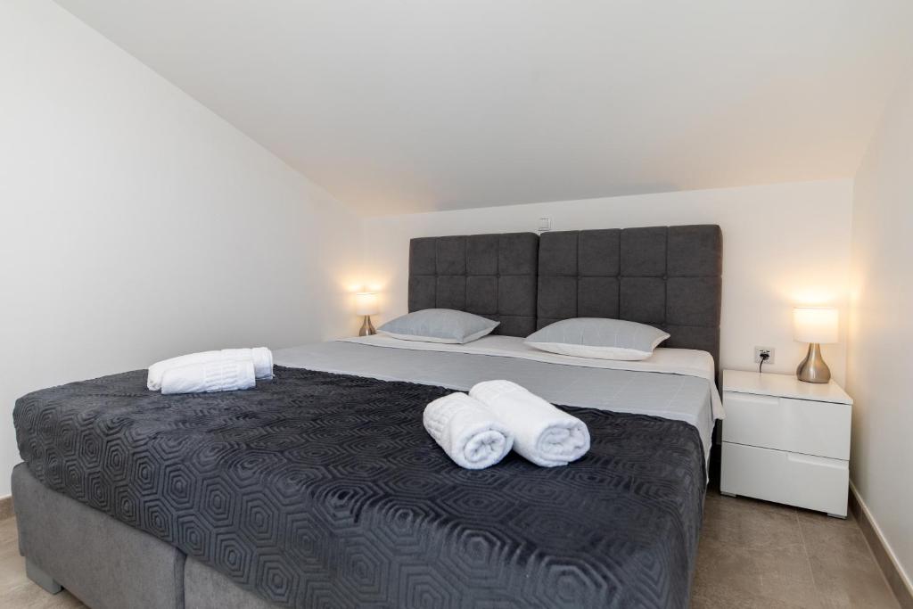 Postel nebo postele na pokoji v ubytování Apartman Gulin