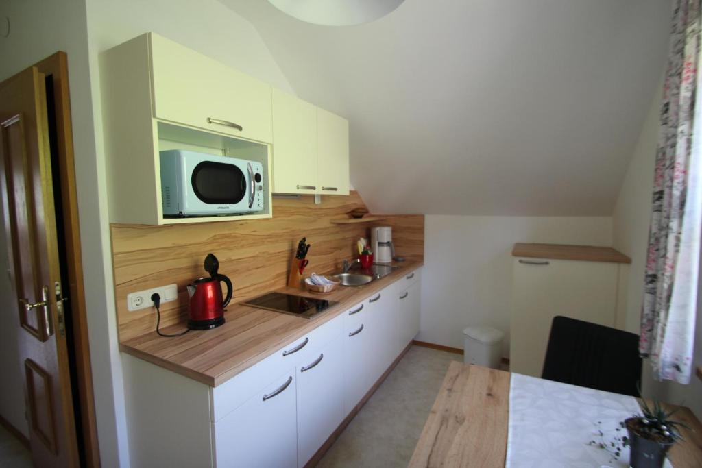 Kuchyň nebo kuchyňský kout v ubytování Ferienwohnung Syen