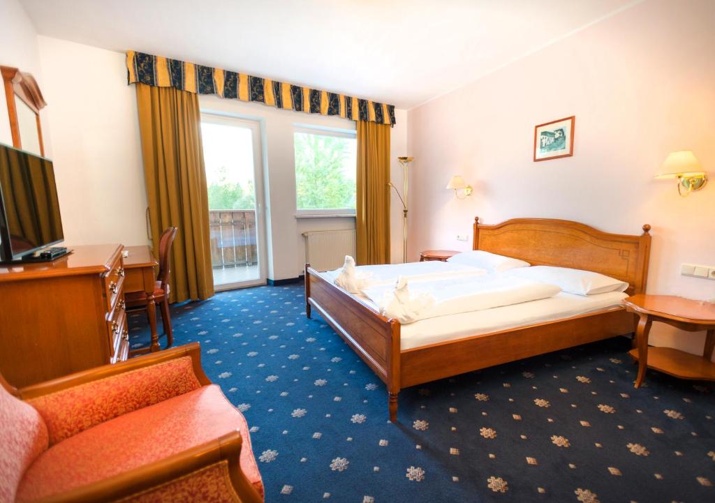 Posteľ alebo postele v izbe v ubytovaní Hotel Marlingerhof