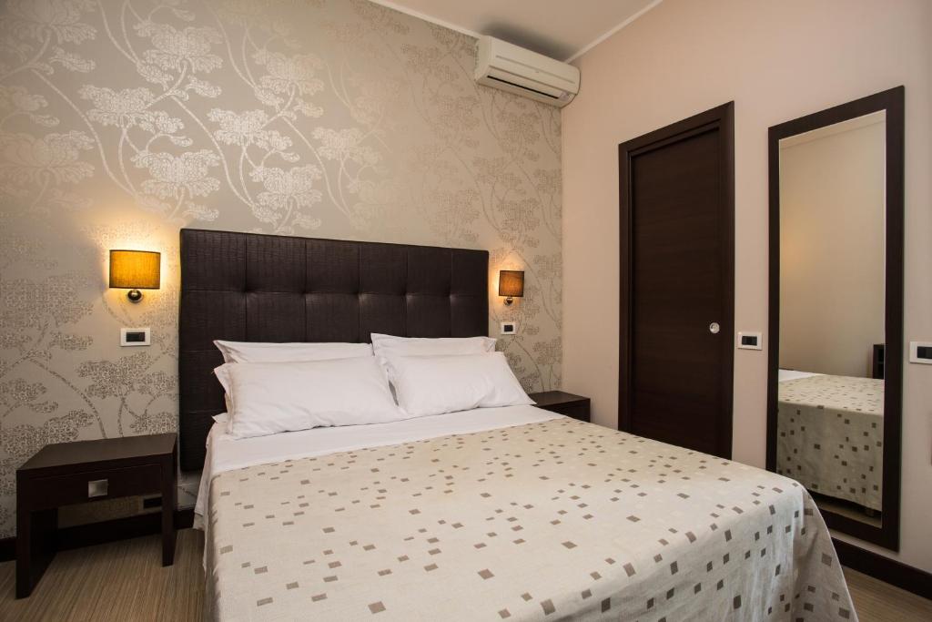 Postel nebo postele na pokoji v ubytování Hotel Lalla Beauty & Relax