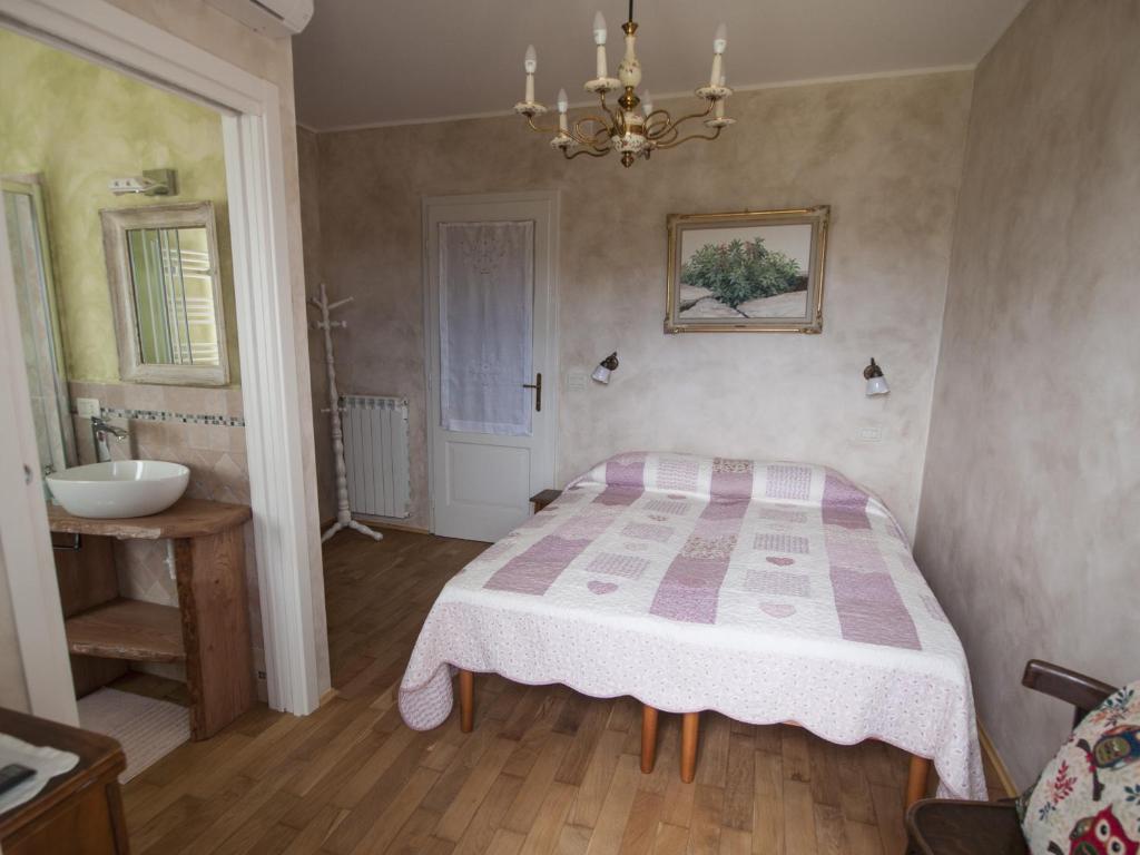 Postel nebo postele na pokoji v ubytování Il Glicine