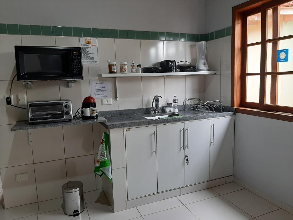 Kuchyň nebo kuchyňský kout v ubytování Amed Rooms