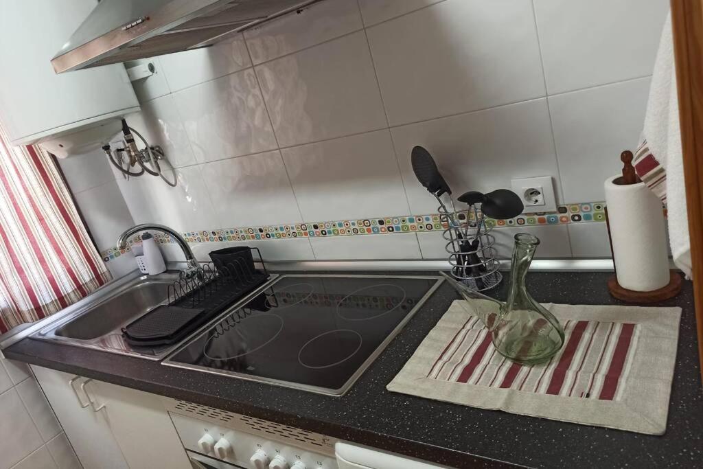 Kuchyň nebo kuchyňský kout v ubytování LA CASA DE LA ABUELA DESI