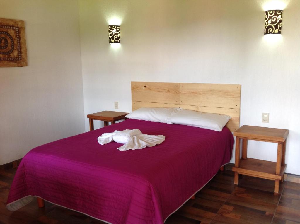 Postel nebo postele na pokoji v ubytování Hotel Finca Las Bovedas