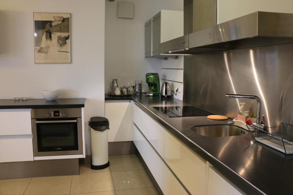 Kuchnia lub aneks kuchenny w obiekcie Center - Atelier Residence