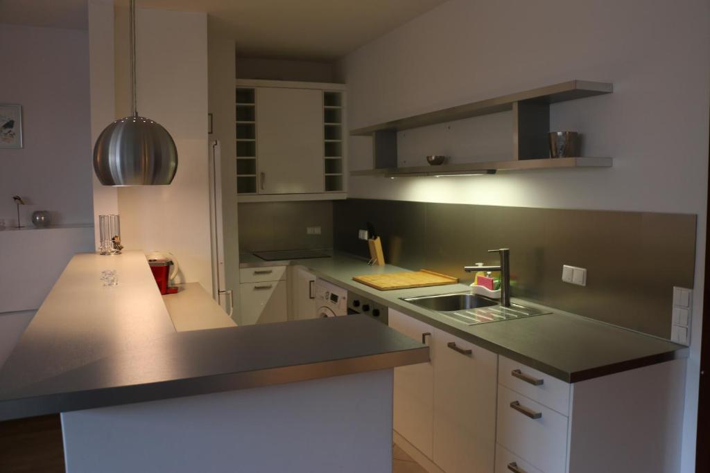 Kuchnia lub aneks kuchenny w obiekcie Center - Atelier Residence