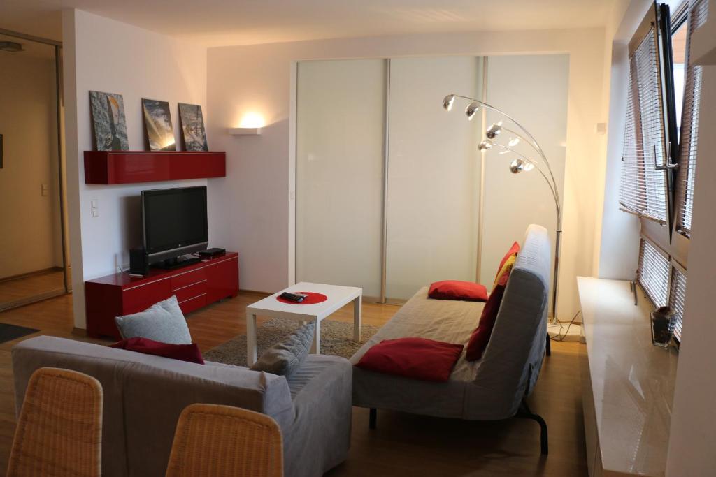 Telewizja i/lub zestaw kina domowego w obiekcie Center - Atelier Residence