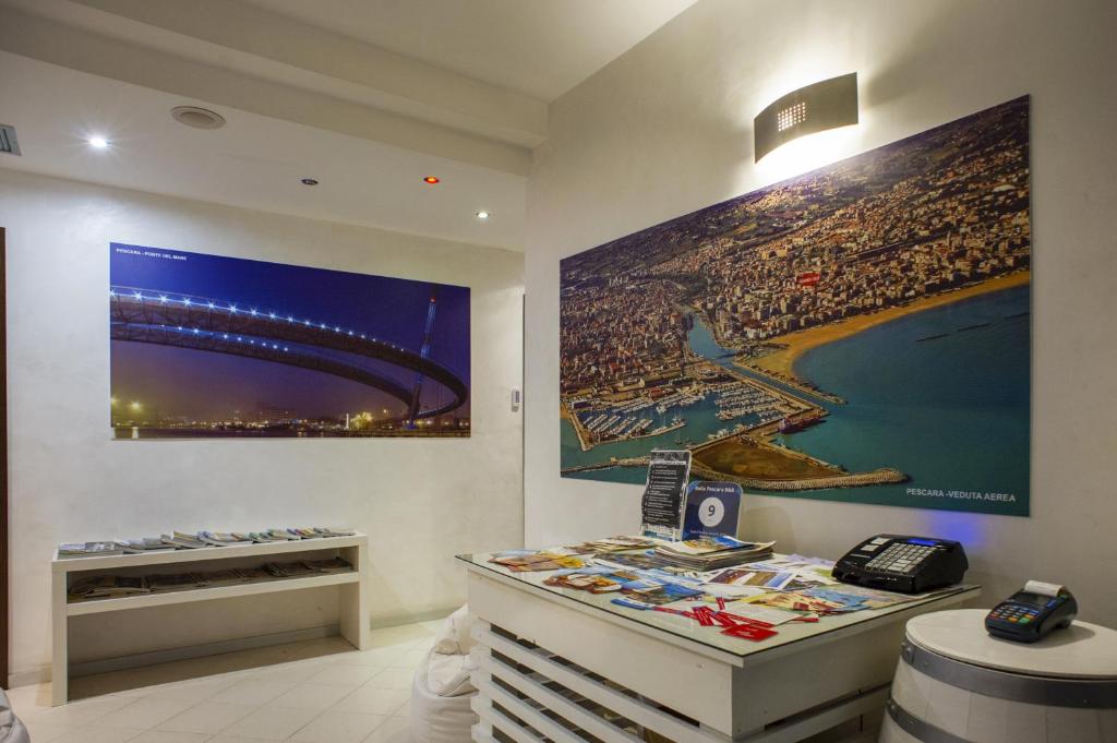 Televízia a/alebo spoločenská miestnosť v ubytovaní Bella Pescara Bb - Abruzzo, Italy