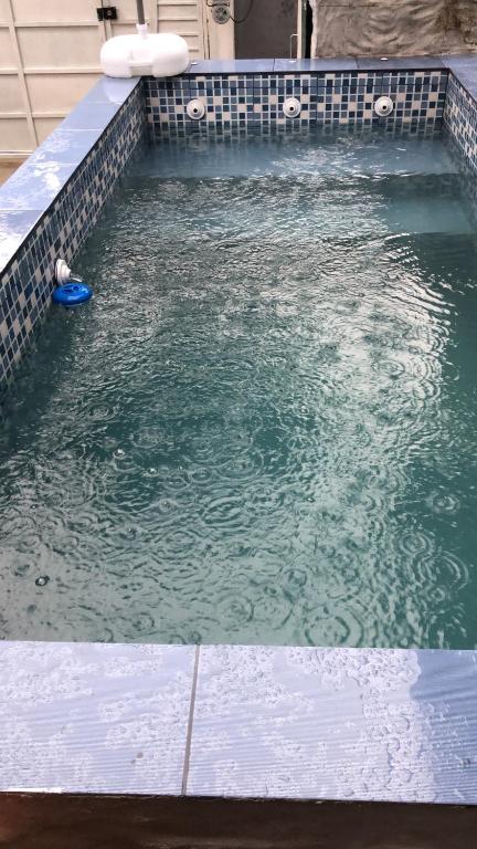  Sobrado com Piscina hidromassagem