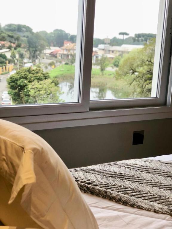 Apartamento de Cobertura Frente ao Lago  Apartamento de Cobertura Frente ao Lago