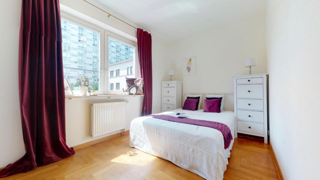 Posteľ alebo postele v izbe v ubytovaní Silent Apartment Center