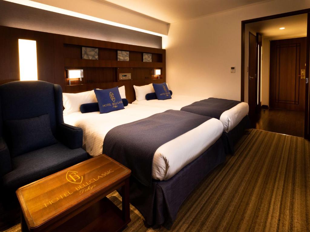 Postel nebo postele na pokoji v ubytování Hotel Bellclassic Tokyo