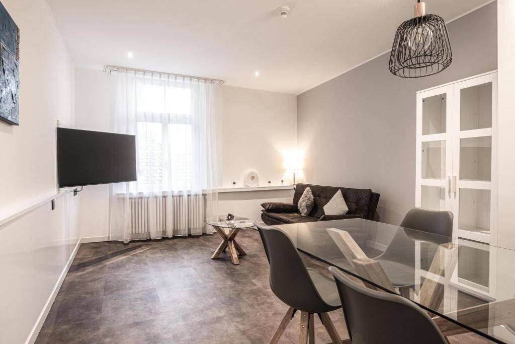 TV a/nebo společenská místnost v ubytování Apart Hotel Amadeo