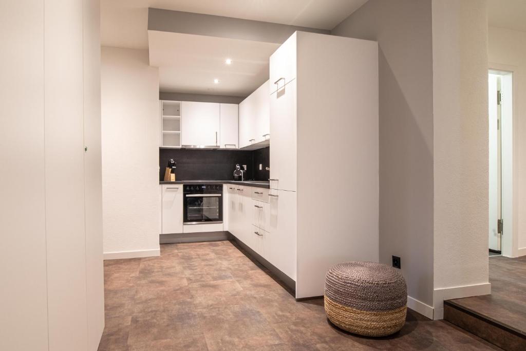 Kuchyň nebo kuchyňský kout v ubytování Apart Hotel Amadeo