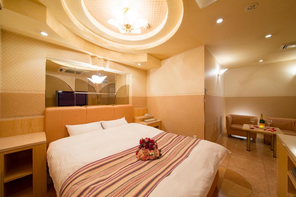 Postel nebo postele na pokoji v ubytování HOTEL THE i Adult only