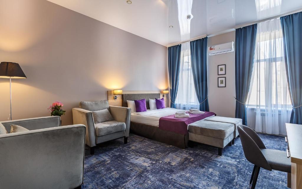 
Кровать или кровати в номере Izdatel' Hotel Tverskaya
