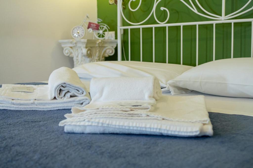 Posteľ alebo postele v izbe v ubytovaní B&B Madam Treviso