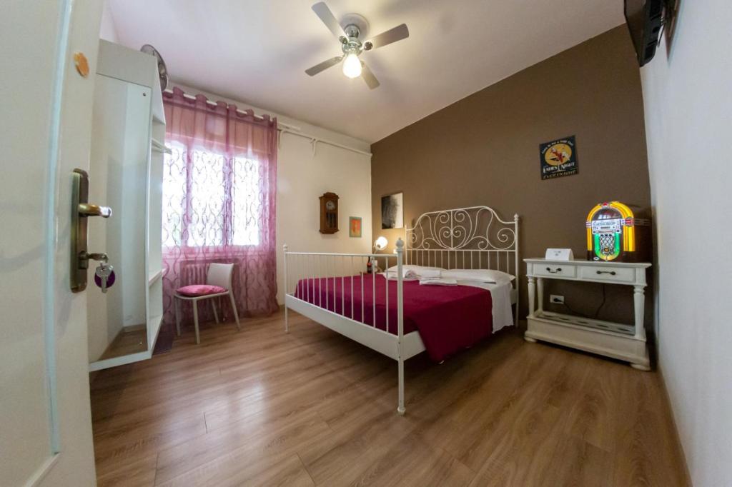 Posteľ alebo postele v izbe v ubytovaní B&B Madam Treviso