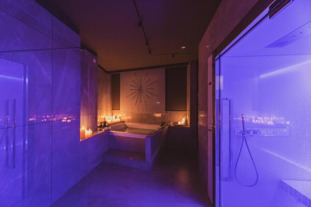 Postel nebo postele na pokoji v ubytování Callistos Hotel & Spa