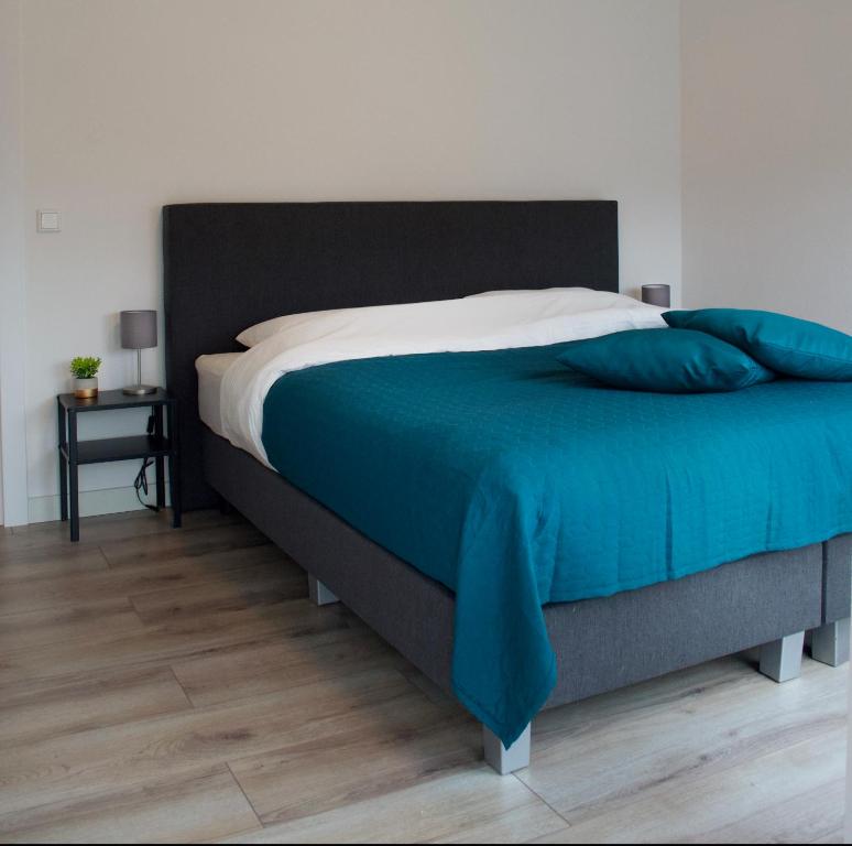 Postel nebo postele na pokoji v ubytování The Residence Enschede