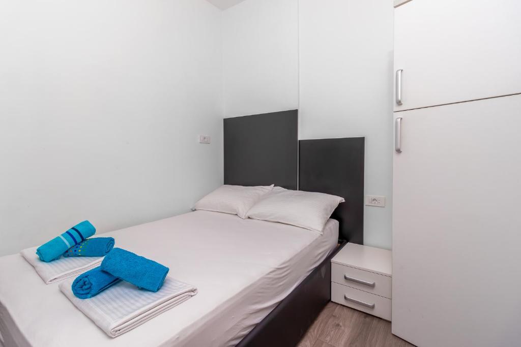 Posteľ alebo postele v izbe v ubytovaní Apartmani Dada