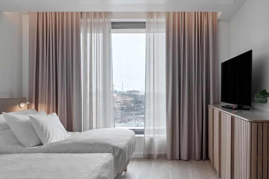 Postel nebo postele na pokoji v ubytování Original Sokos Hotel Tripla Helsinki
