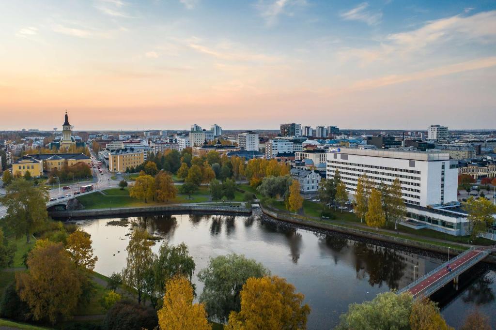 a view of a city with a river at Radisson Blu Hotel, Oulu in Oulu
