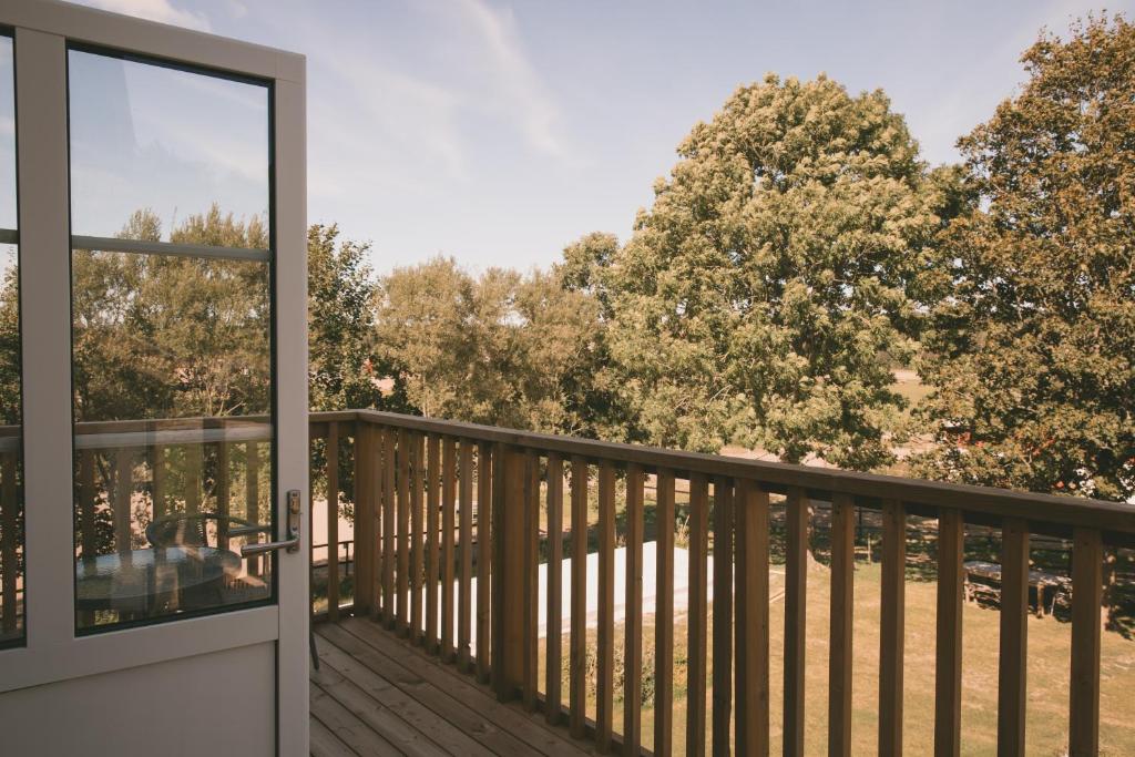 Balkón nebo terasa v ubytování Toric Farmlodge
