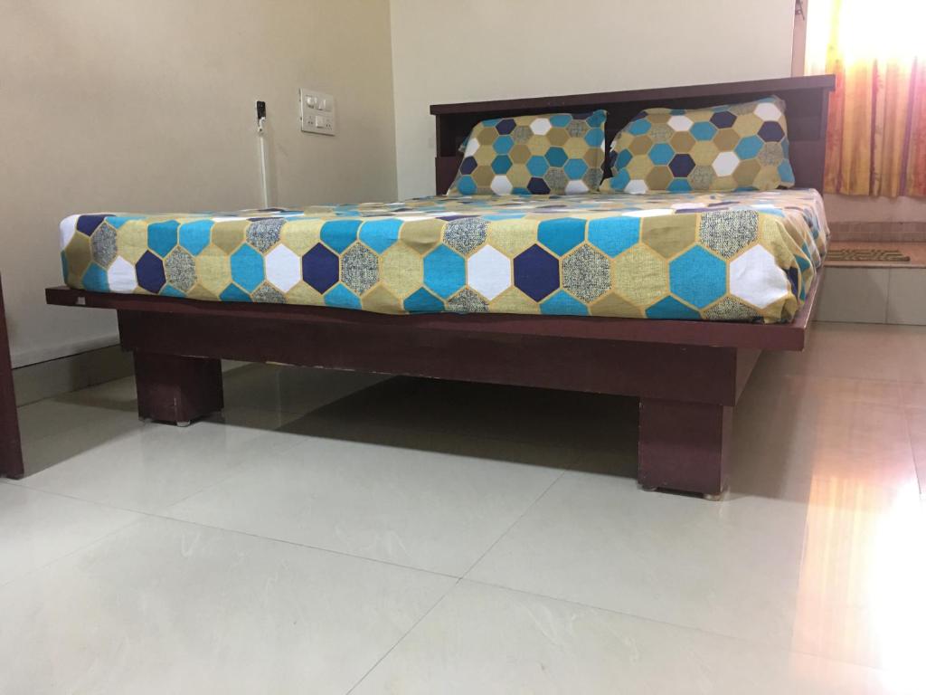 En eller flere senger på et rom på Kvm Tourist Home