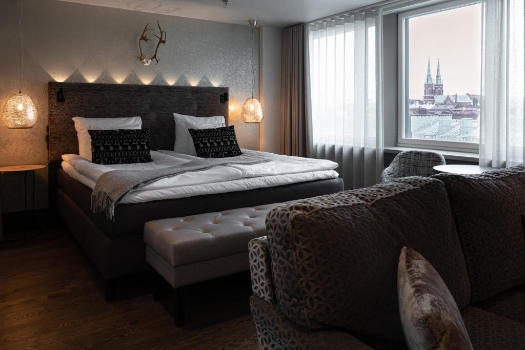 Postel nebo postele na pokoji v ubytování Lapland Hotels Bulevardi