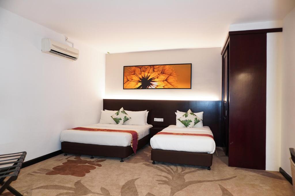 Postel nebo postele na pokoji v ubytování Amansari Residence Resort