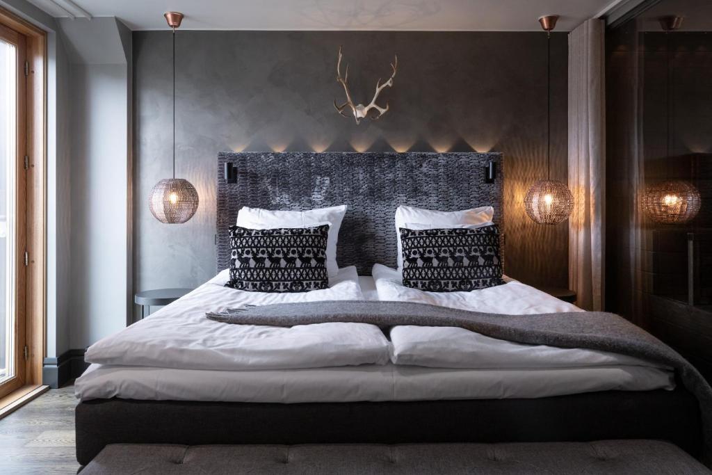 Postel nebo postele na pokoji v ubytování Lapland Hotels Bulevardi