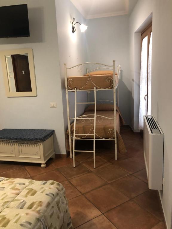 Postel nebo postele na pokoji v ubytování Agriturismo ciociaro " il colle " HOTEL RISTORANTE