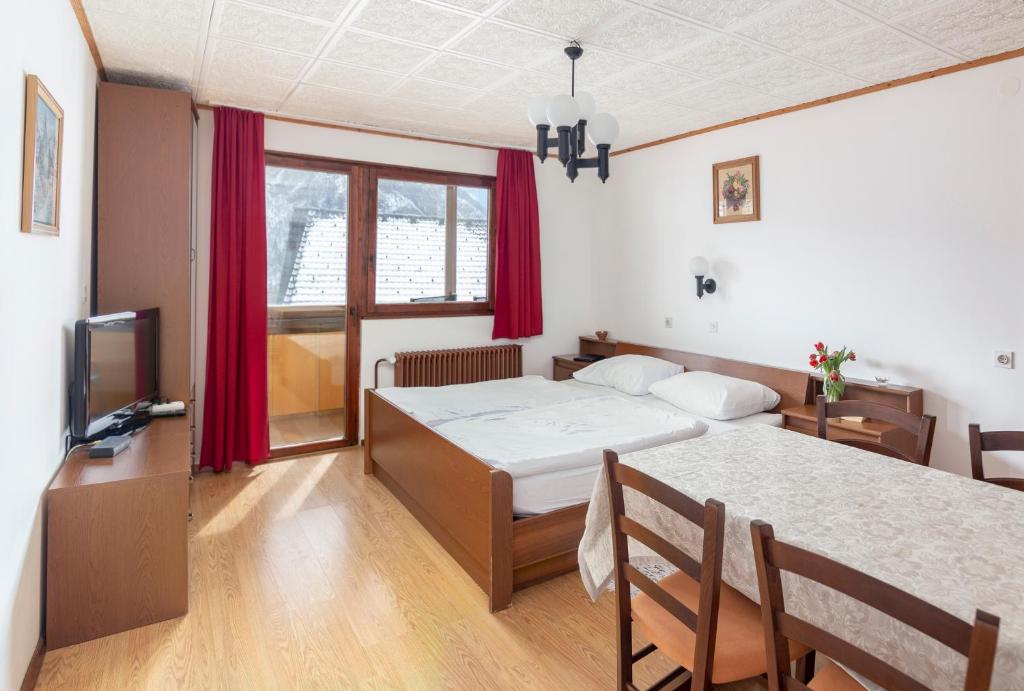 Postel nebo postele na pokoji v ubytování Apartment house Jager