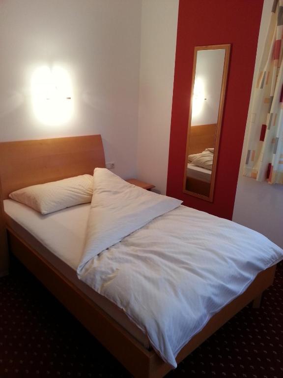 Letto o letti in una camera di Gasthof Zur Post