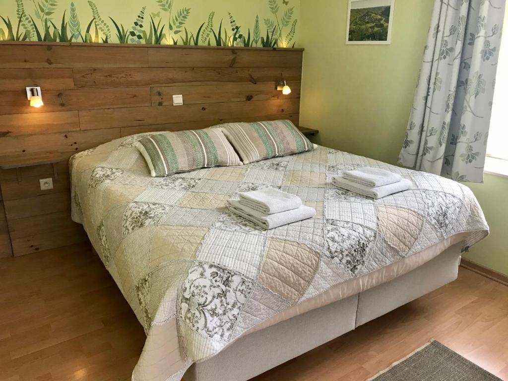 Postel nebo postele na pokoji v ubytování Taos B&B