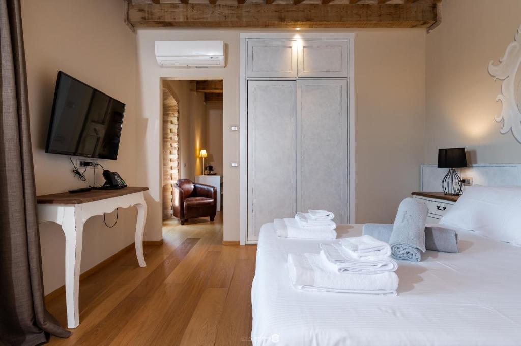 Posteľ alebo postele v izbe v ubytovaní Villa Anitori Prestige Relais & Spa