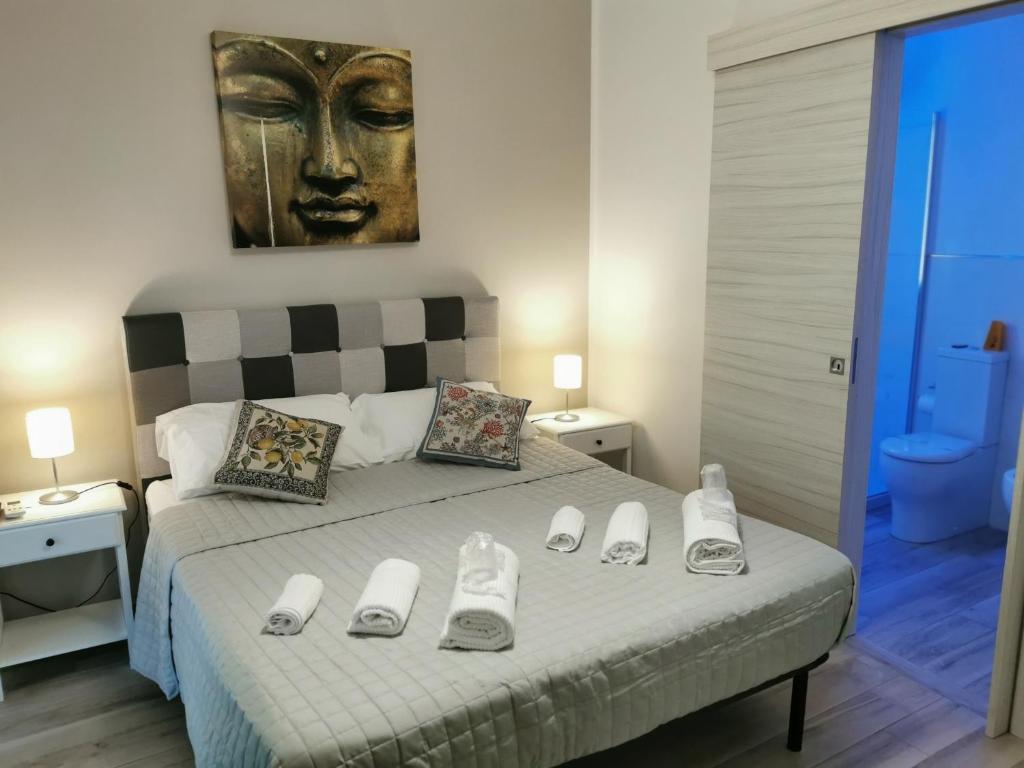 Letto o letti in una camera di B&B CESARE'S Guests