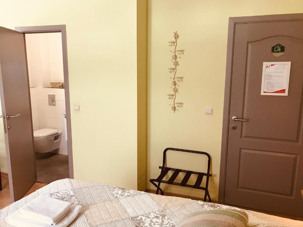 Postel nebo postele na pokoji v ubytování Taos B&B