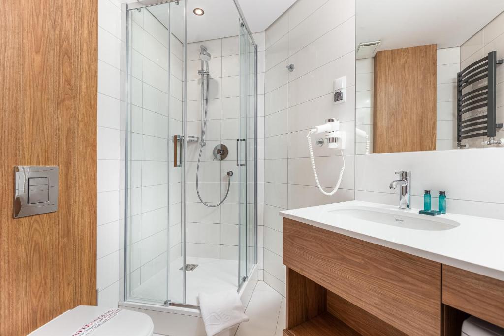 Kúpeľňa v ubytovaní City Apartments - Młyńska 49