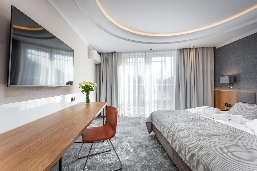 Posteľ alebo postele v izbe v ubytovaní City Apartments - Młyńska 49