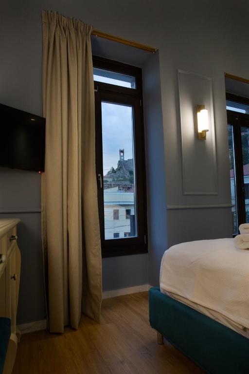 A bed or beds in a room at Battaglia di Lepanto