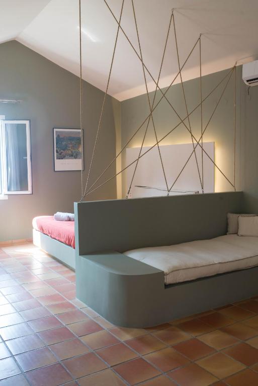 Postel nebo postele na pokoji v ubytování Mounda Beach Hotel