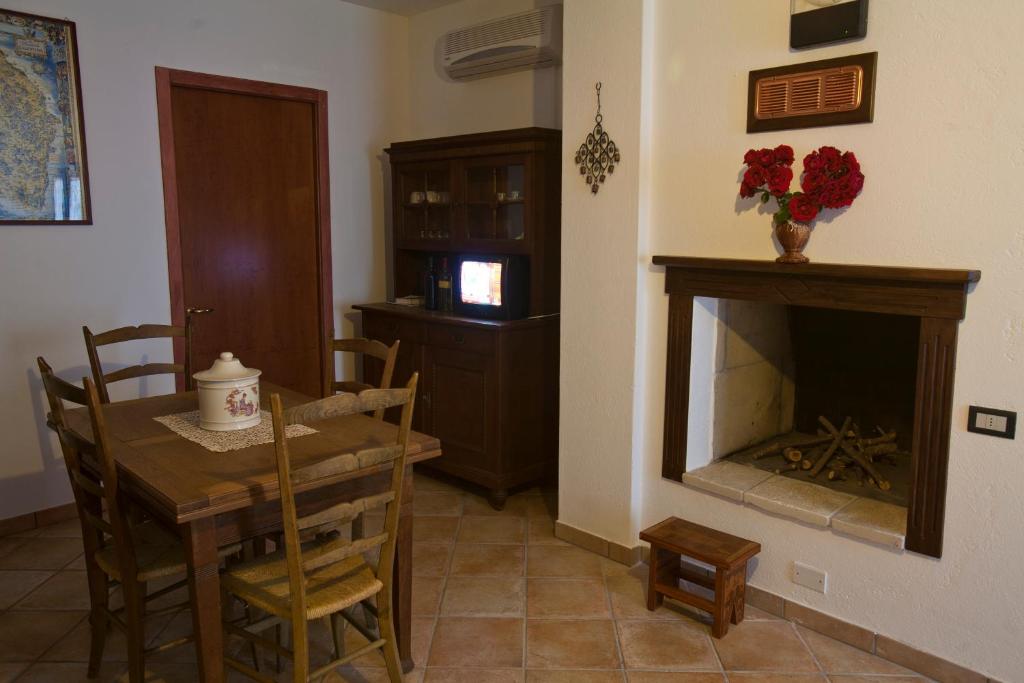 TV a/nebo společenská místnost v ubytování Residencefusaro pajare Specchia