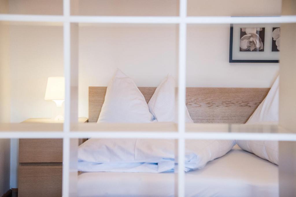 Posteľ alebo postele v izbe v ubytovaní Apparthotel Feldhof - Living and Bistro