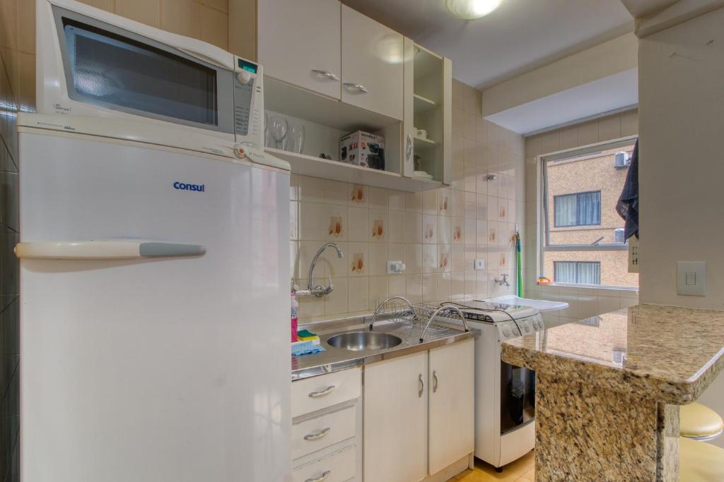 Ótimo apartamento no Centro mobiliado e com garagem