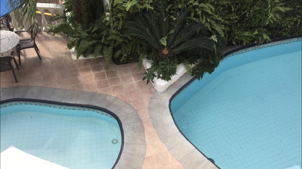 Bazén v ubytování Arcos hotel nebo v jeho okolí