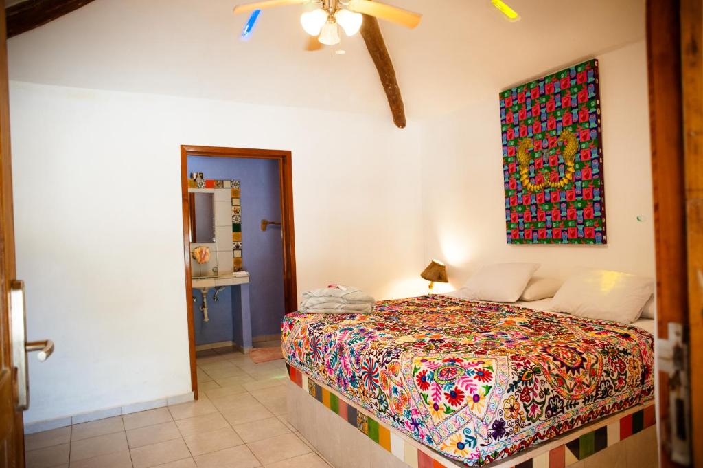 Postel nebo postele na pokoji v ubytování Nacional Beach Club & Bungalows