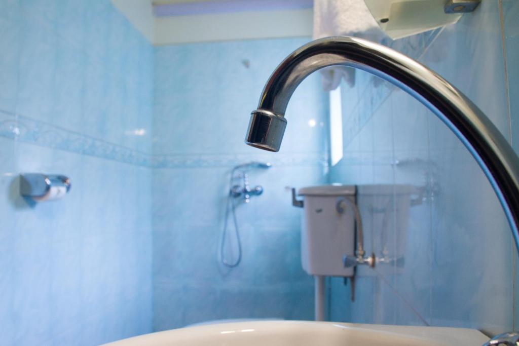 Koupelna v ubytování Sandton Hotel Kasese